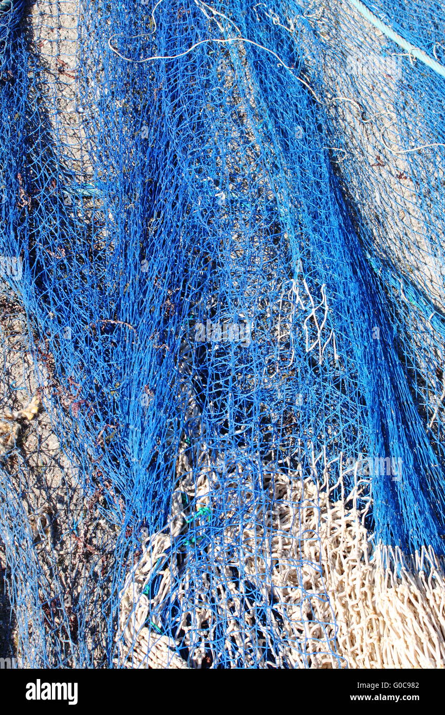 Fishing nets stretched in a port Stock Photo