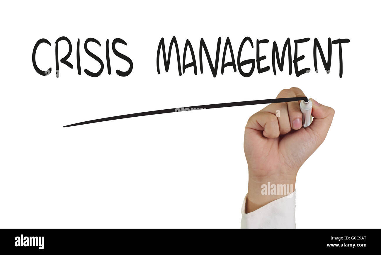 Business concept image of a hand holding marker and write Crisis Management isolated on white Stock Photo