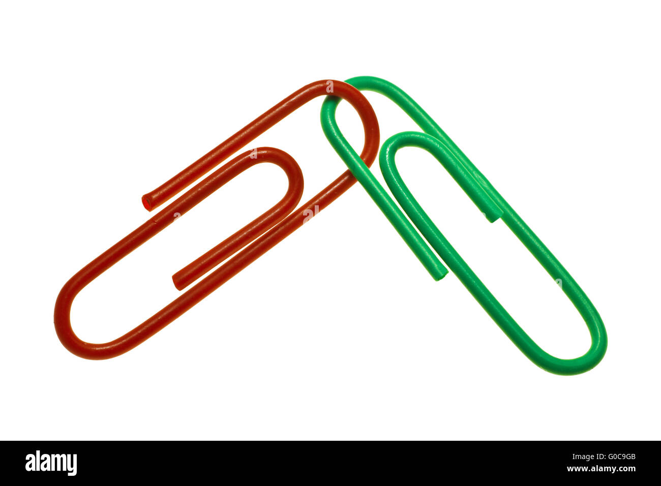 Red and green paper clips, symbolic image Stock Photo