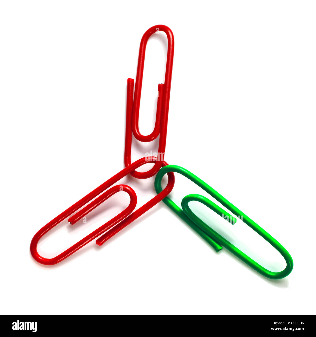 Red, red and green paper clips, symbolic image Stock Photo