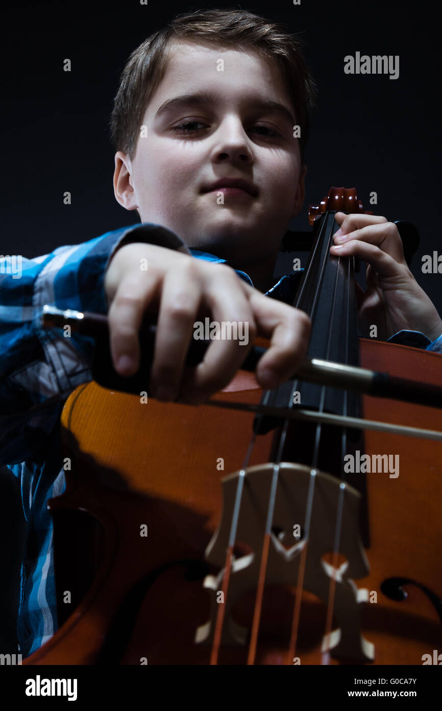 Boy playing cello violoncello hires stock photography and images Alamy
