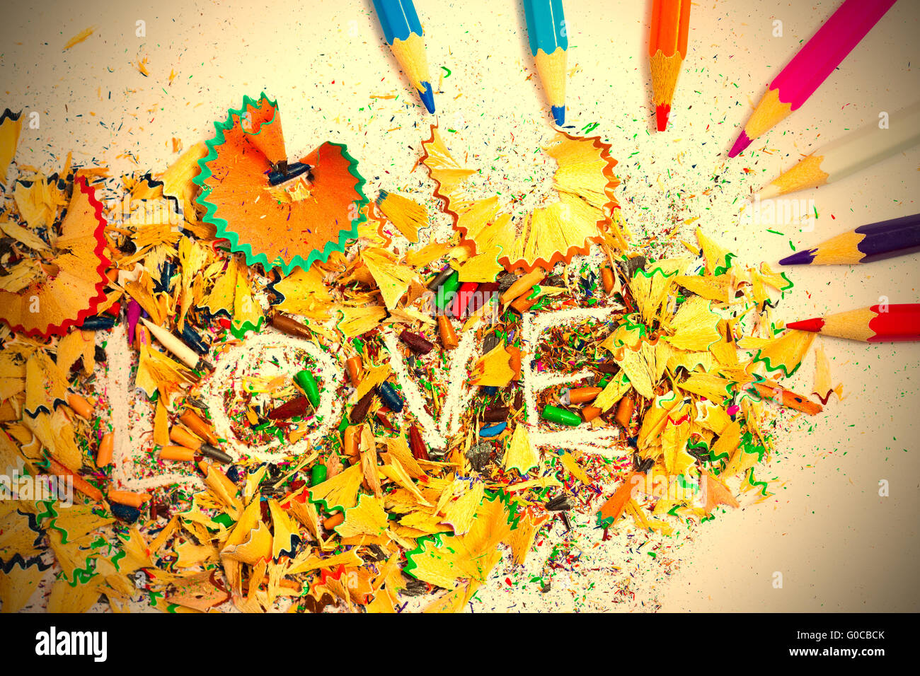The word LOVE on the background pencil shavings Stock Photo