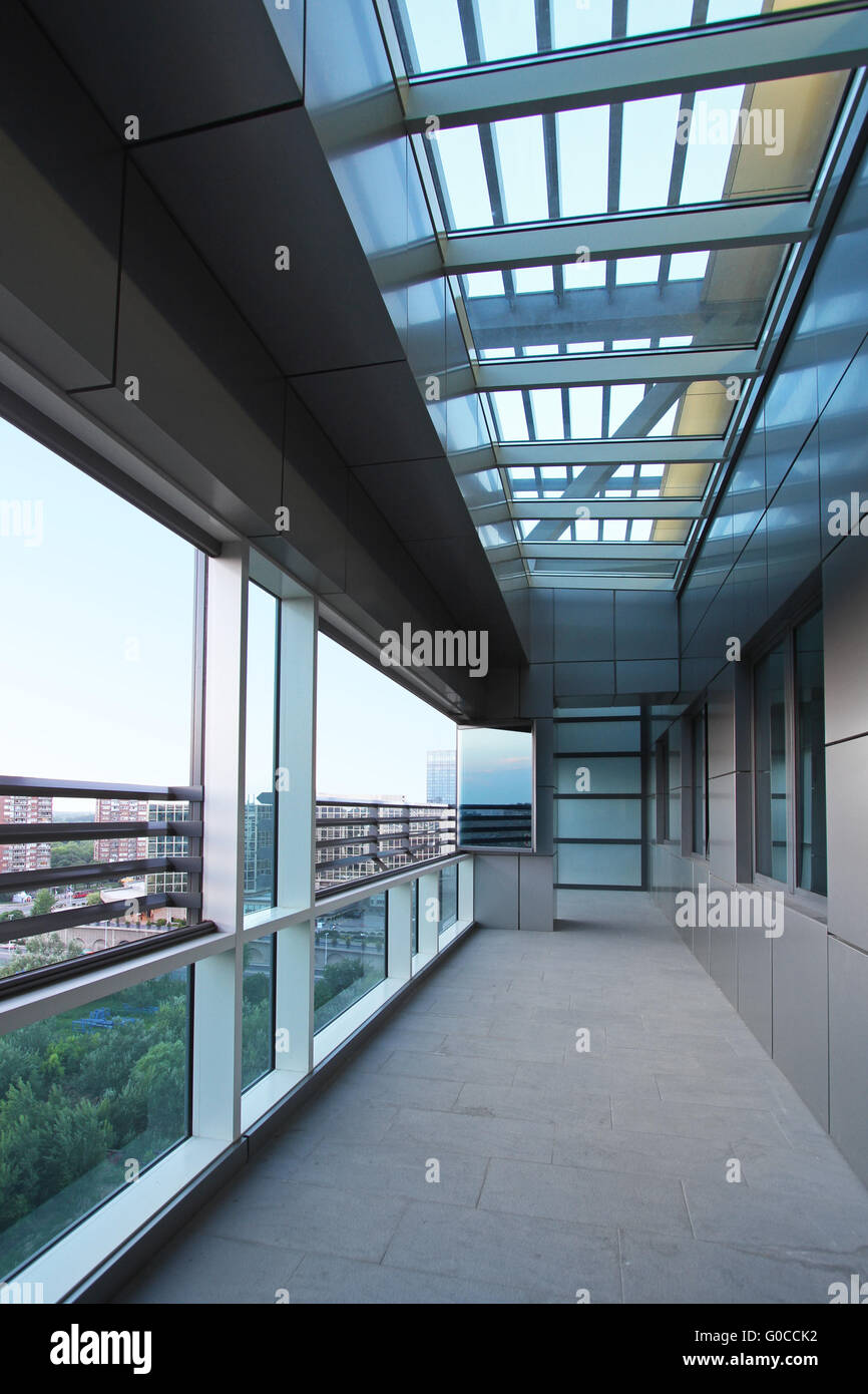 View of Long terrace with sky window in new penthouse apartment Stock Photo - Alamy