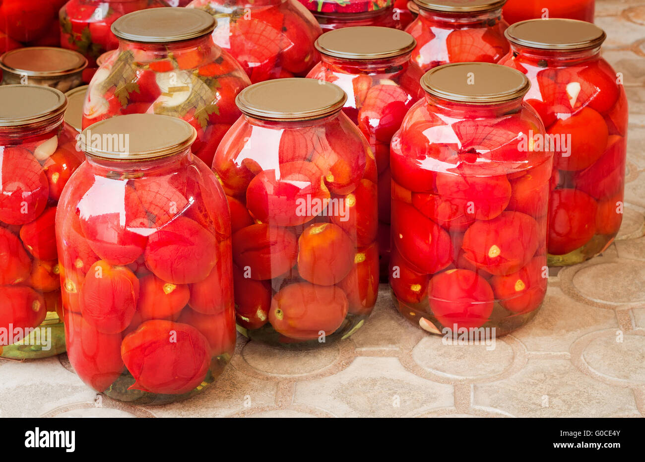 Tinned tomatoes in big glass jars Stock Photo Alamy