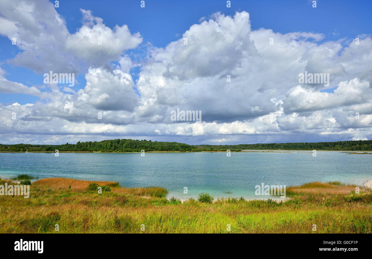 Landscape with a lake with transparent clay bottom near St. Petersburg  Stock Photo - Alamy
