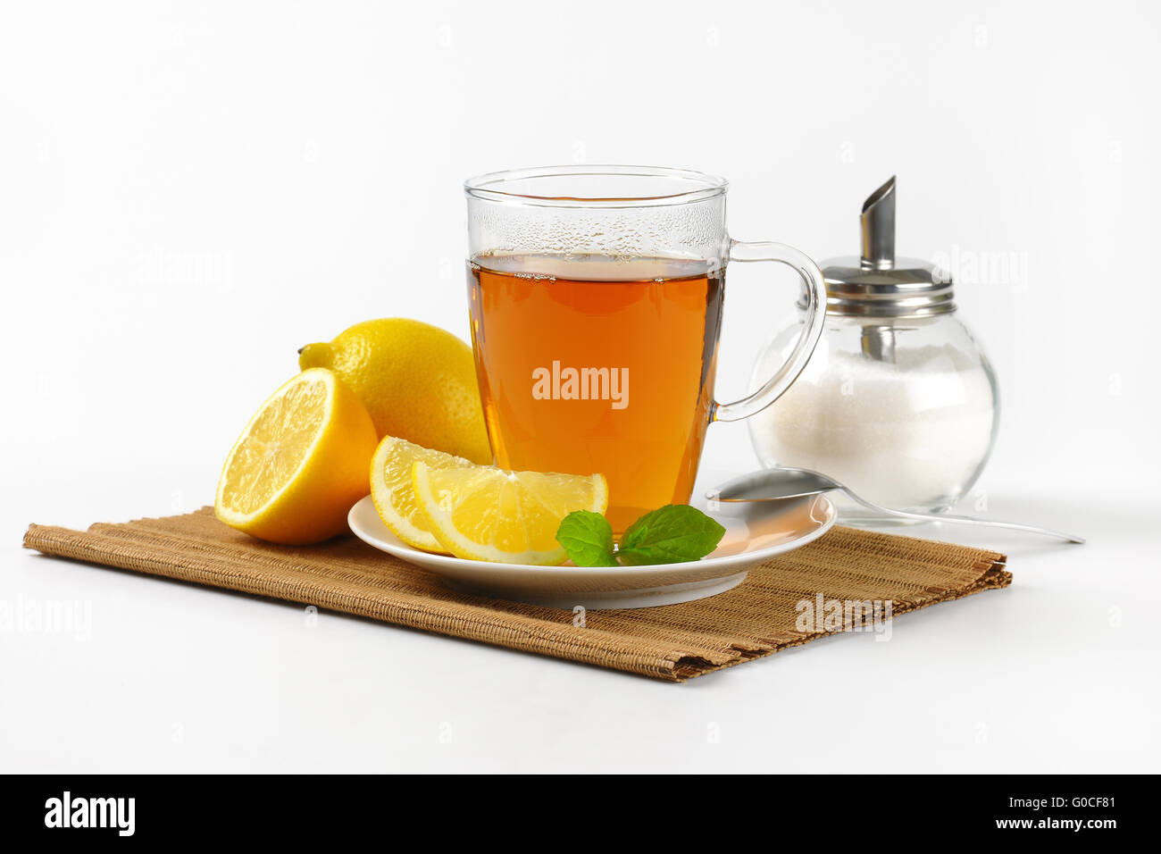 cup of black tea with lemon and sugar Stock Photo - Alamy