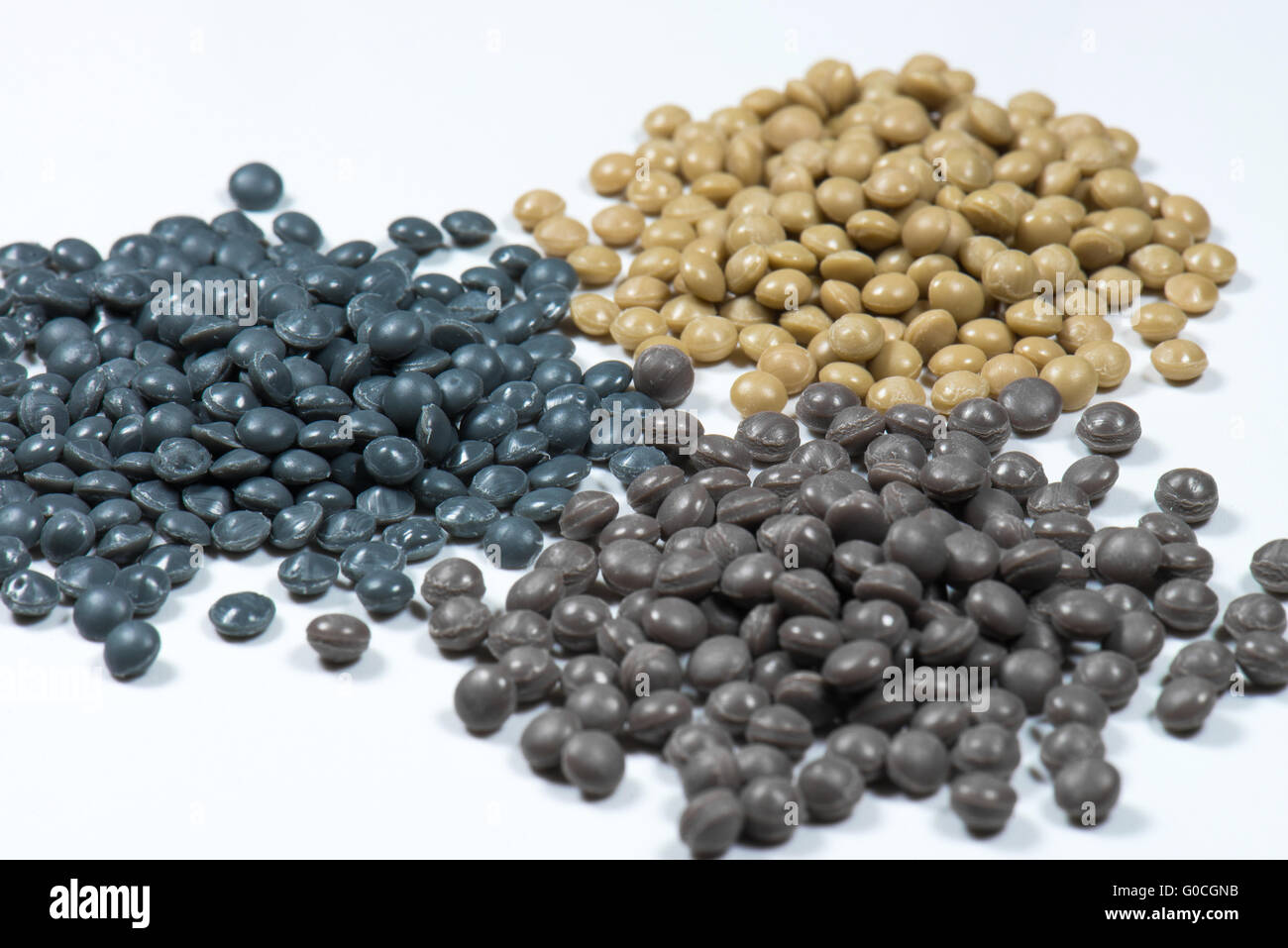 brown and grey polymer pellets Stock Photo