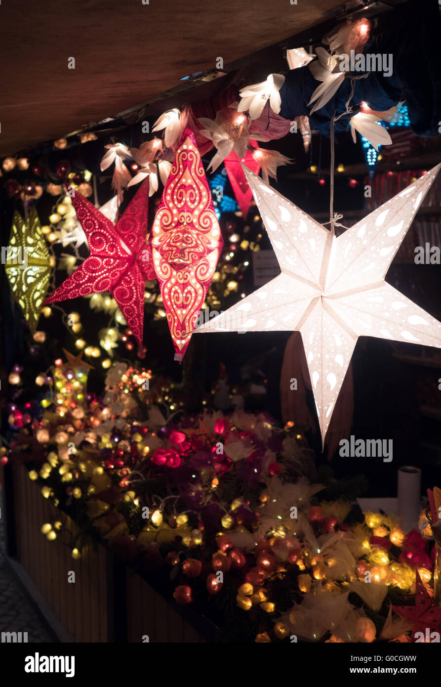 Illuminated stars and lights  on a Christmas marke Stock Photo