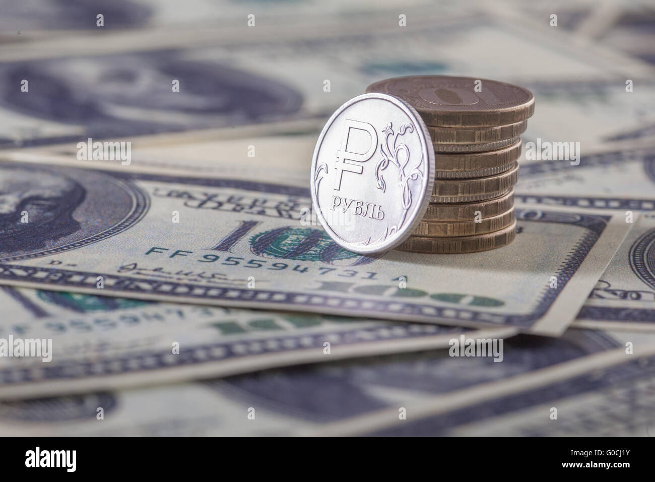 New russian ruble coin and american dollars Stock Photo