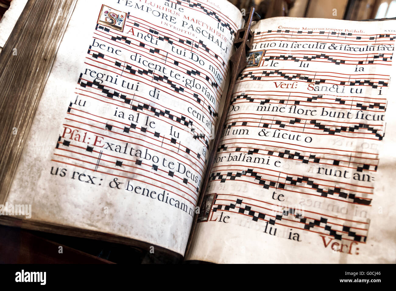 Closeup of an old hymnal-book with Latin text Stock Photo