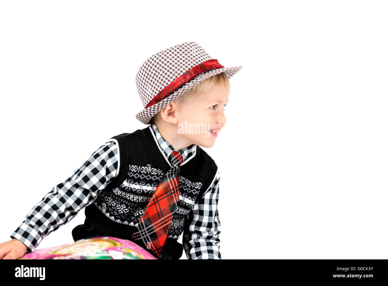 Smiling happy boy in hat shot in the studio on a white background Stock Photo