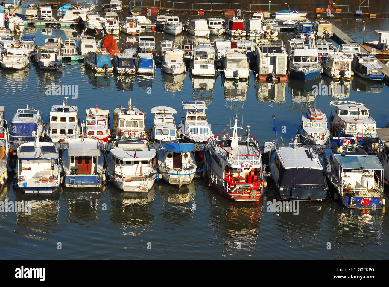 Various parked boats in row Stock Photo Alamy