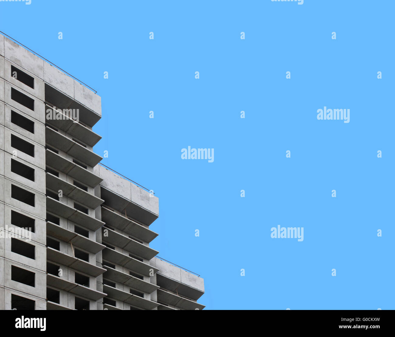 concrete buildings on blue sky background Stock Photo - Alamy
