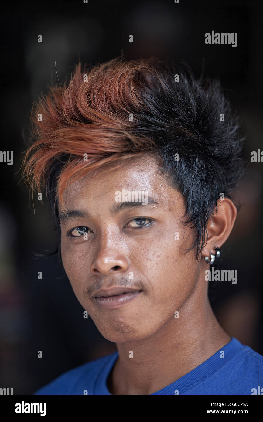 Portrait unidentified local bajau suluk guy pose for camera in Mabul Island, Sabah. Stock Photo