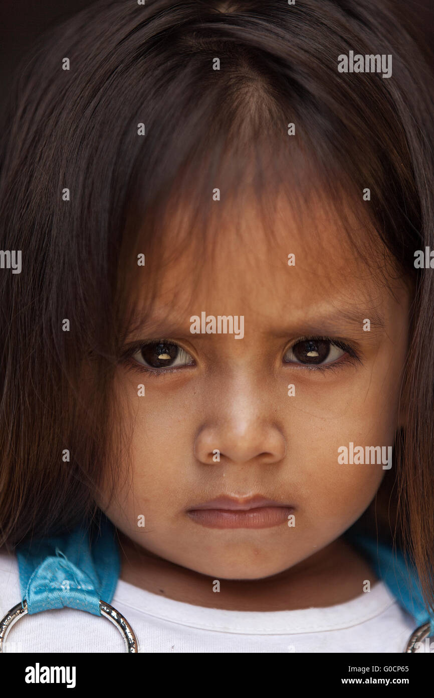 Portrait unidentified local bajau suluk children pose for camera in Mabul Island, Sabah. Stock Photo