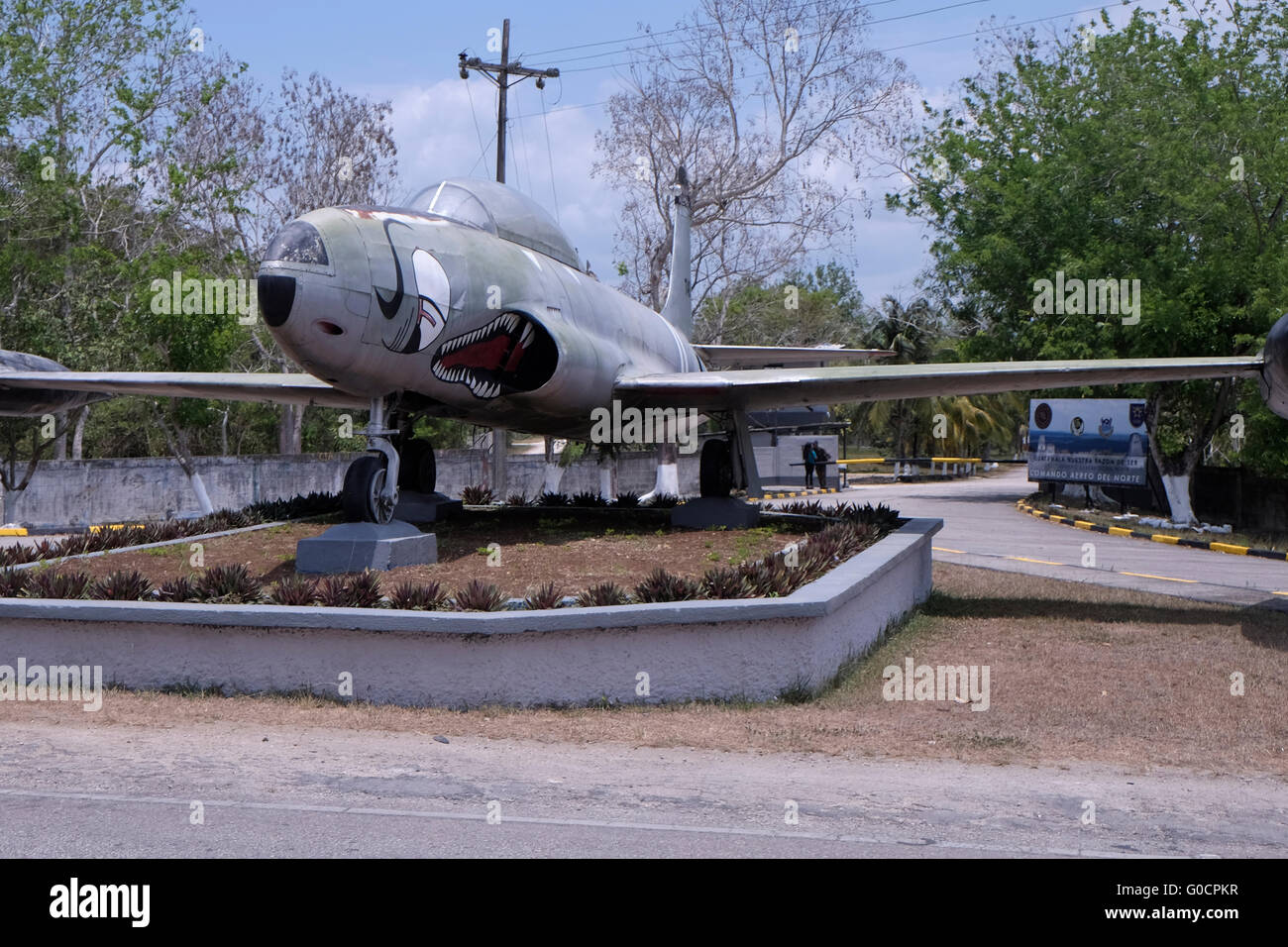 An old jet airplane placed at the entrance to an air force military base in the region of Peten Basin in northern Guatemala Stock Photo