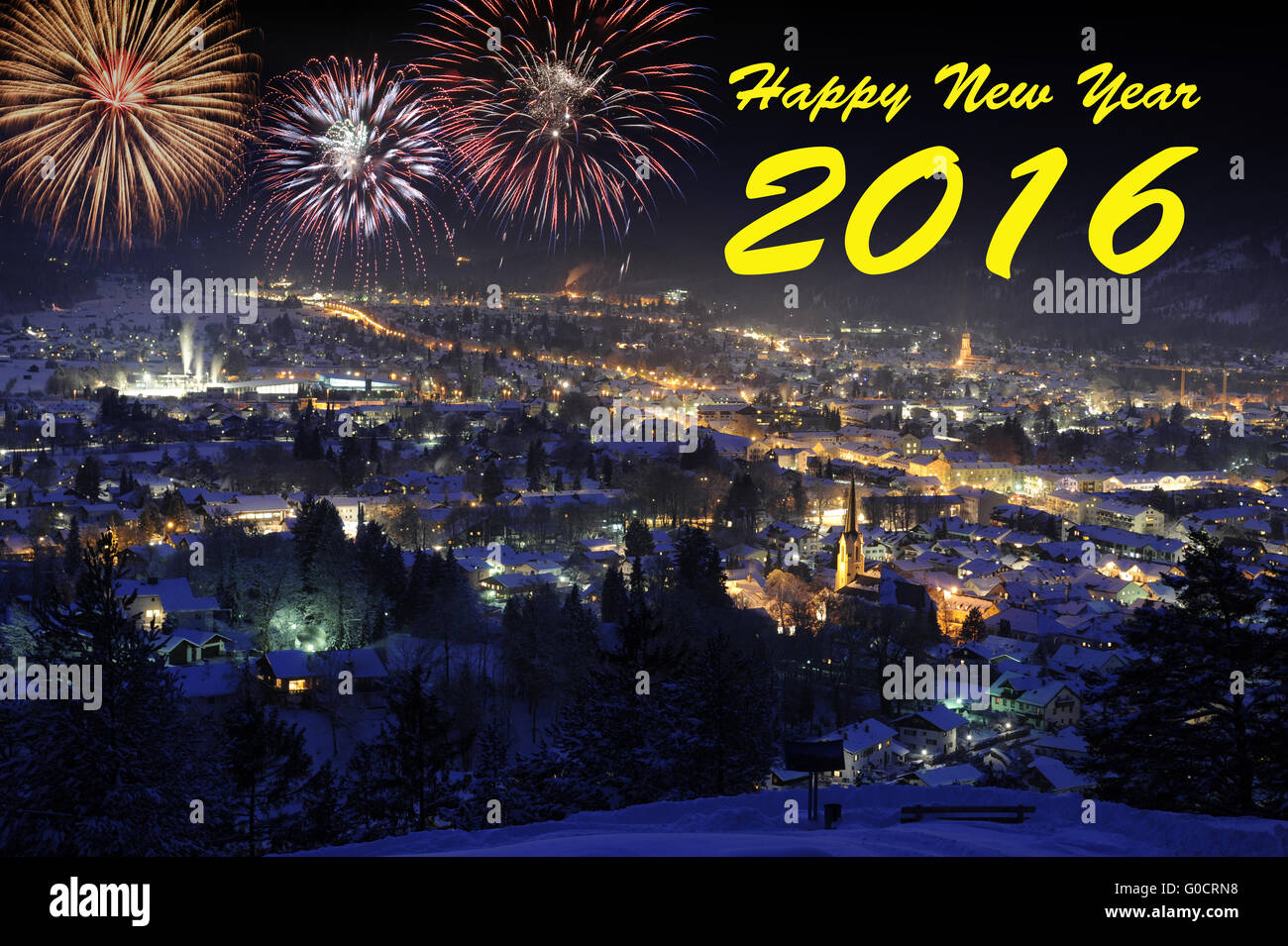 happy new year with firework over city Garmisch Stock Photo