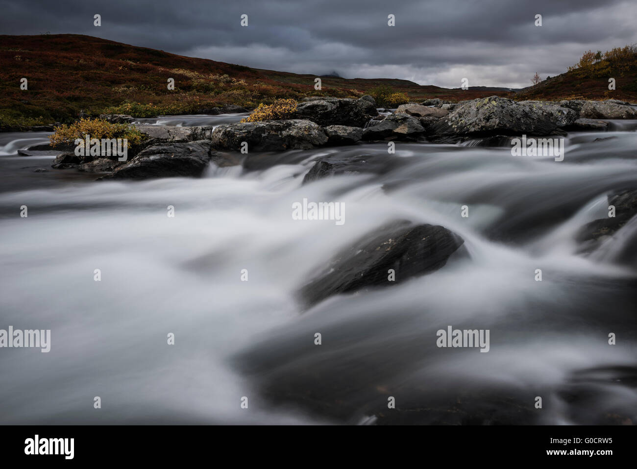 Flowing river outside of Syter hut, Kungsleden trail, Lapland, Sweden Stock Photo