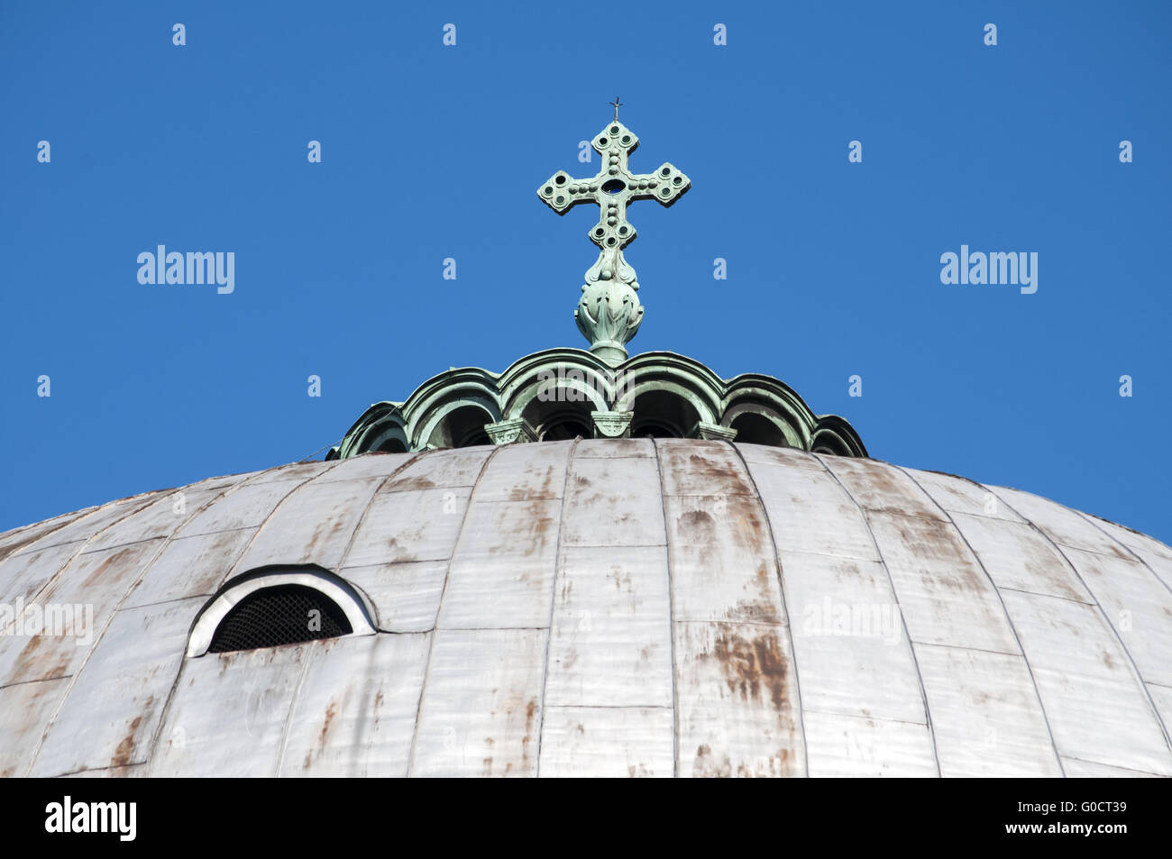 Top of Orthodox church dome with cross on blue sky Stock Photo - Alamy