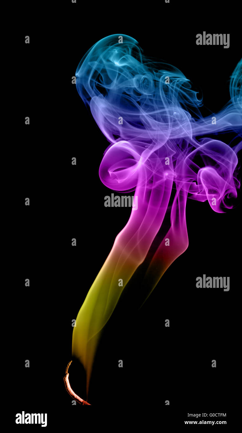 Abstract multicolored smoke on a dark background Stock Photo