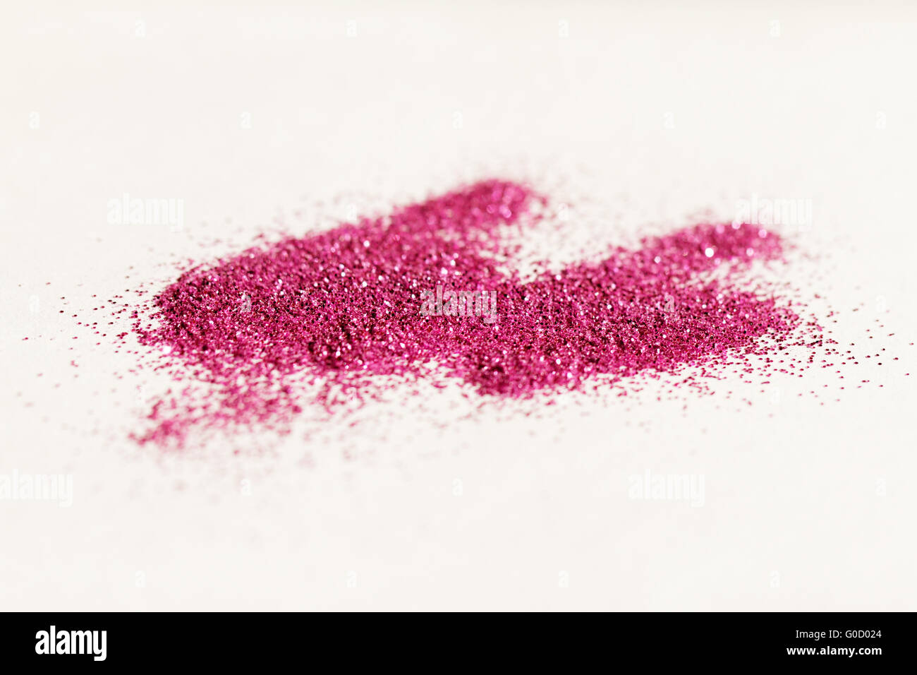 Magenta glitter on light background - macro photo Stock Photo