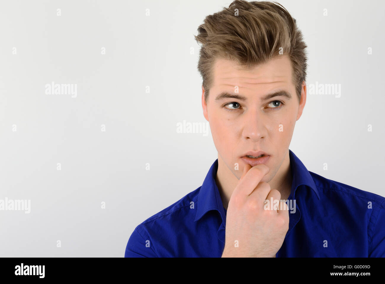 Young man on a light background Stock Photo