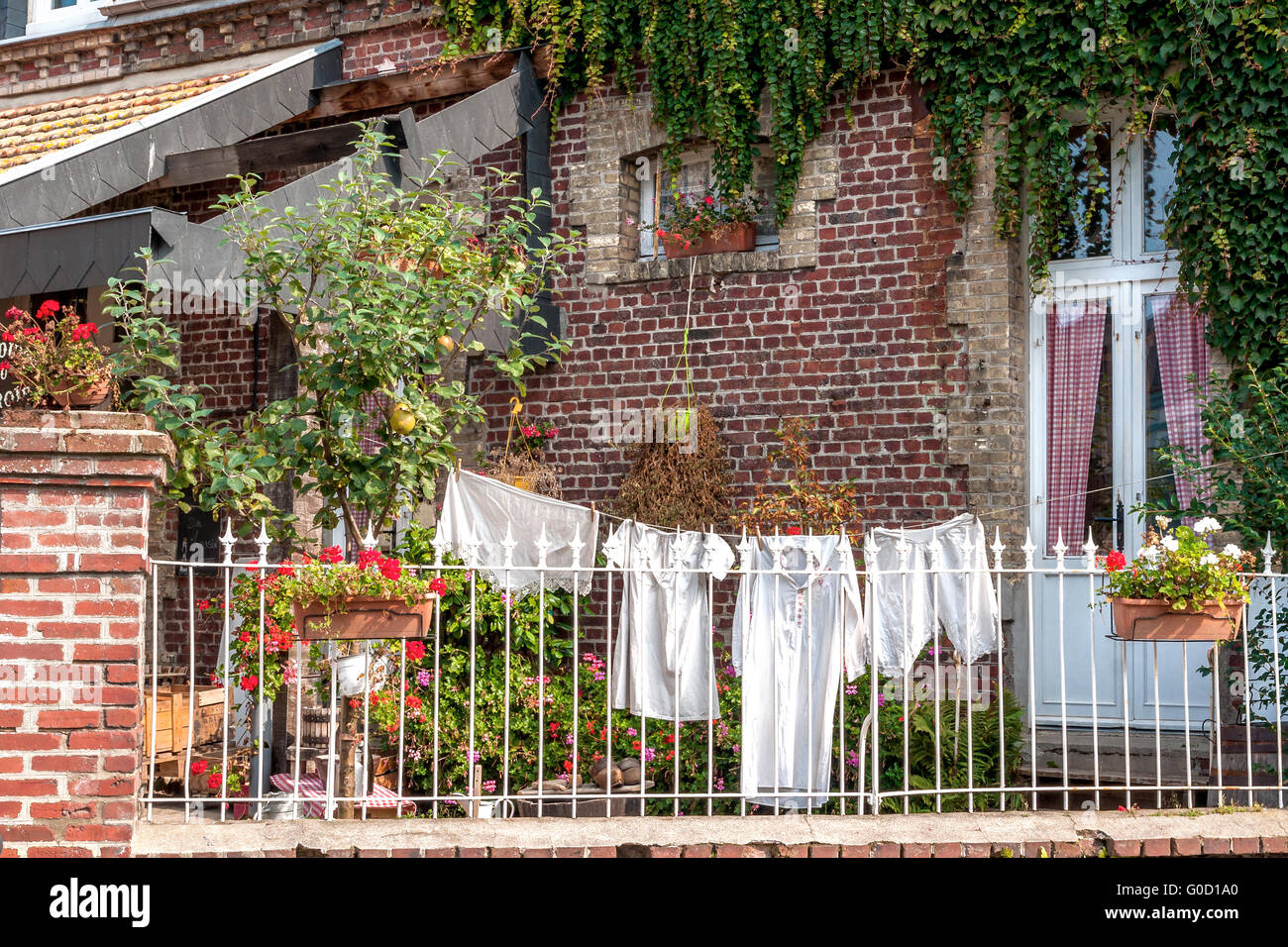historic underwear on a clothesline in front of an Stock Photo