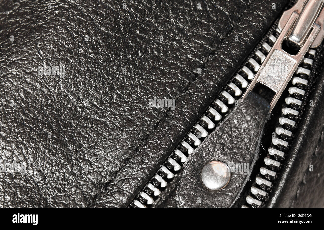 Part black leather clothing with a zipper. macro Stock Photo