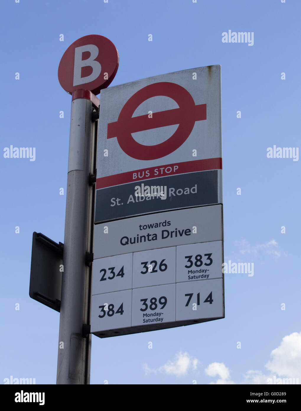 London Bus Stop sign located on St. Albans Road, High Barnet, London, UK Stock Photo
