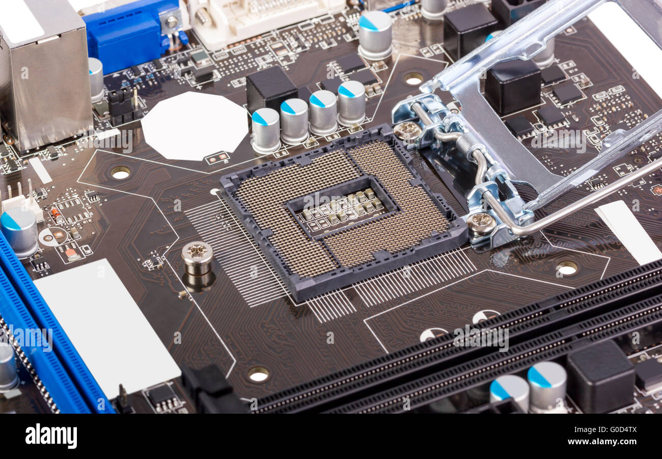 Empty CPU processor socket with pins motherboard Stock Photo