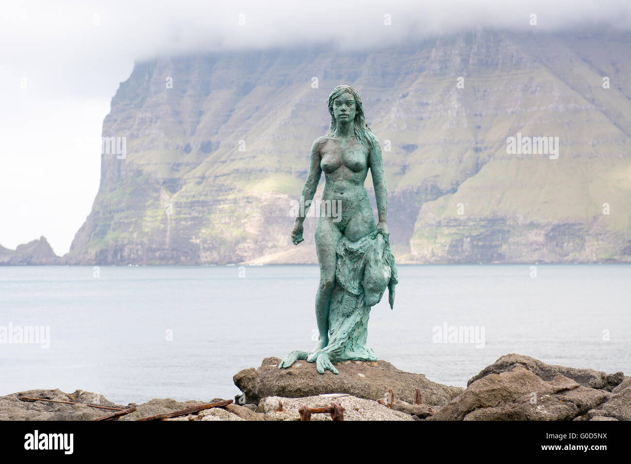 Statue of Selkie or Seal Wife in the village of Mikladalur on Kalsoy