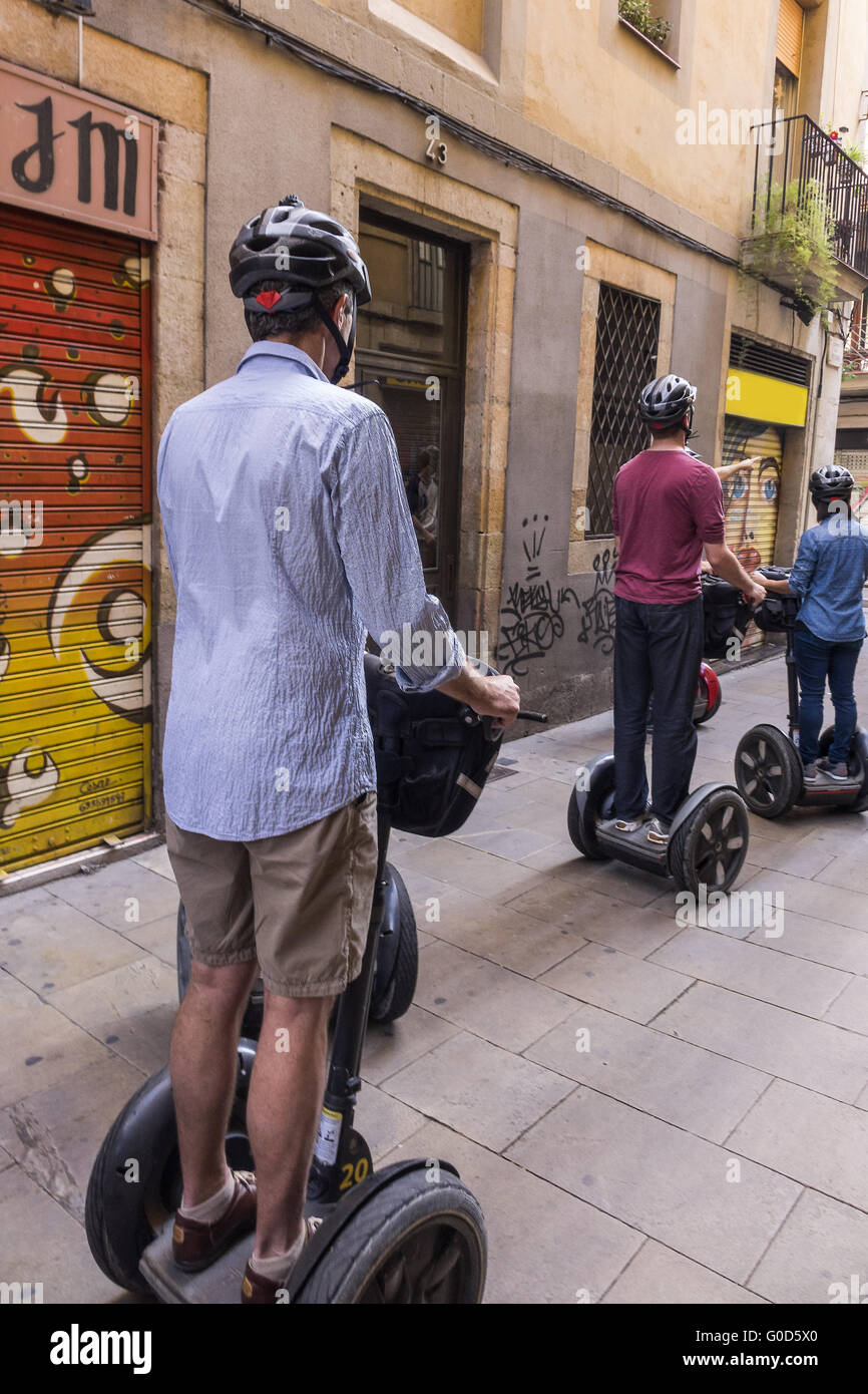 Riding Segways Down The Street Barcelona Spain Stock Photo