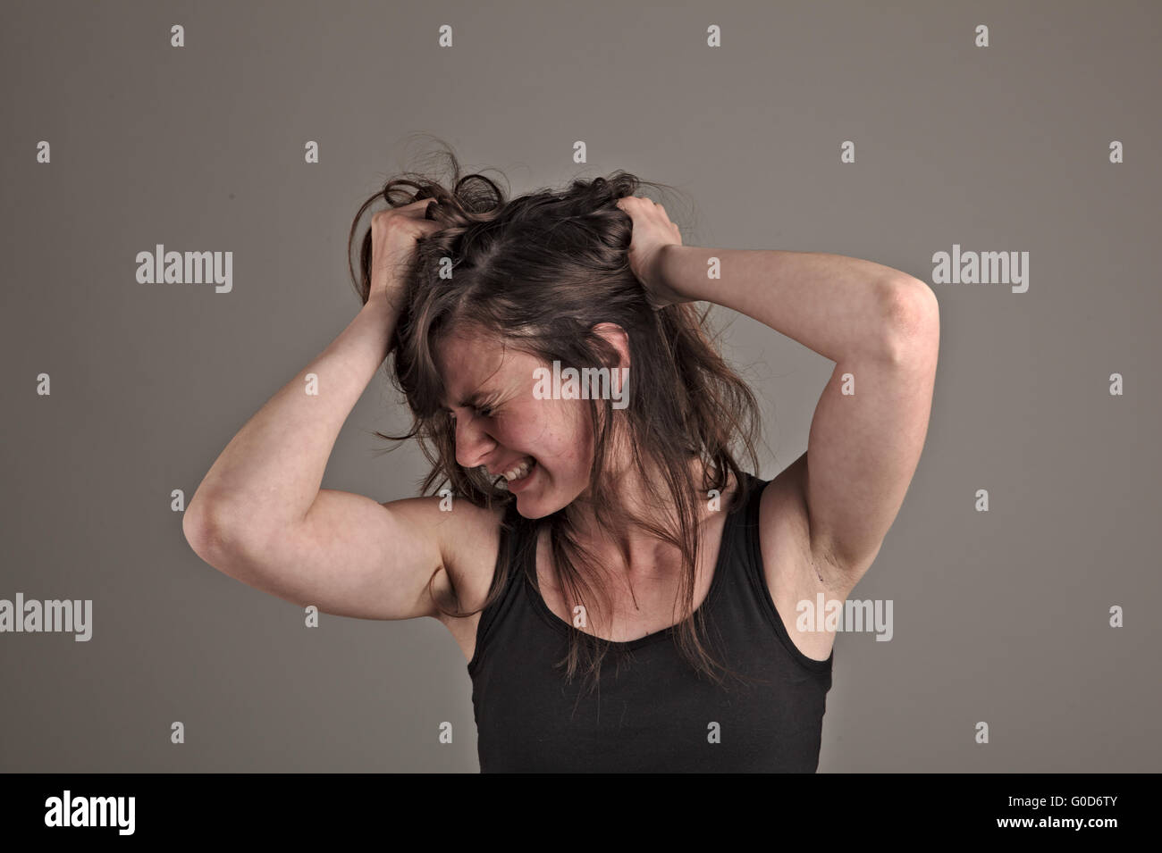 Young woman is in despair Stock Photo