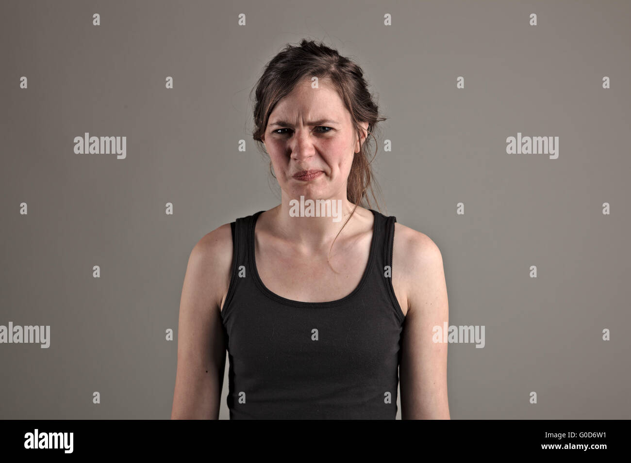 Young woman disgusted Stock Photo