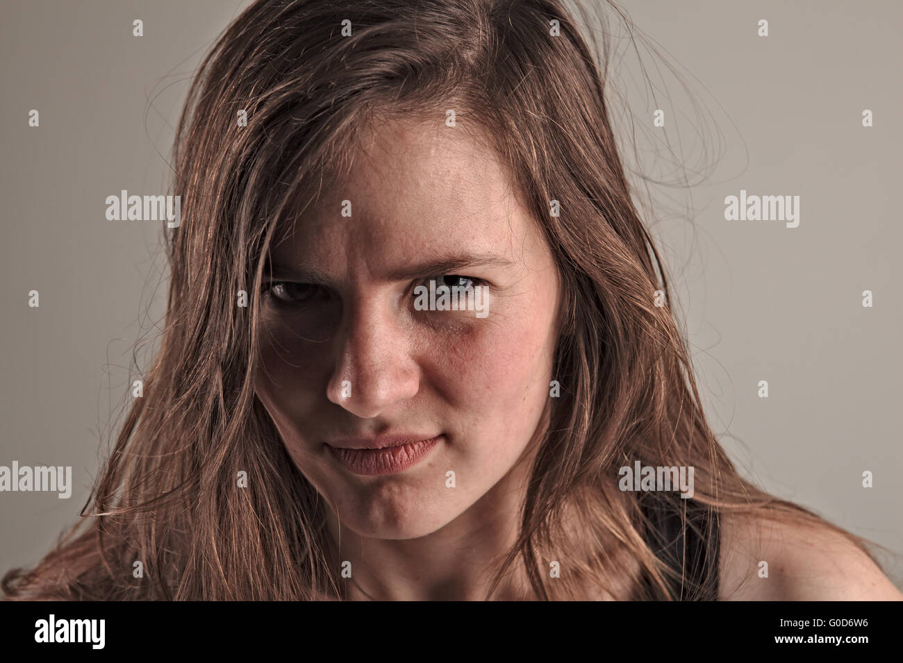 Young woman is in a rage Stock Photo