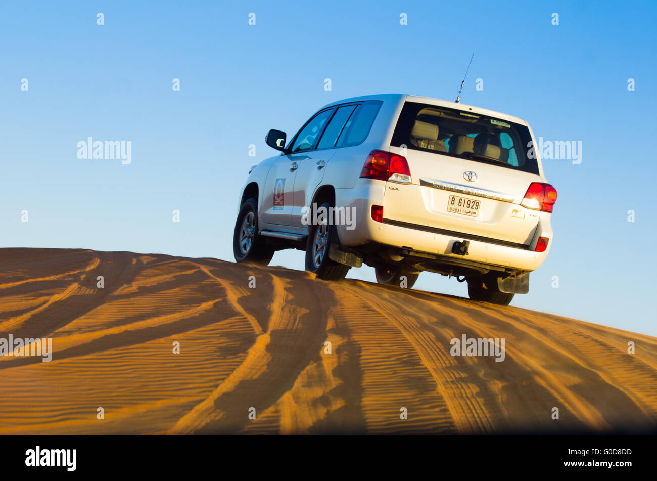 NOV 29 -DUBAI, UAE:  4x4 drives in the desert during a safari in the dunes on the  28th of november 2013 in Dubai, UAE.The Dubai Stock Photo