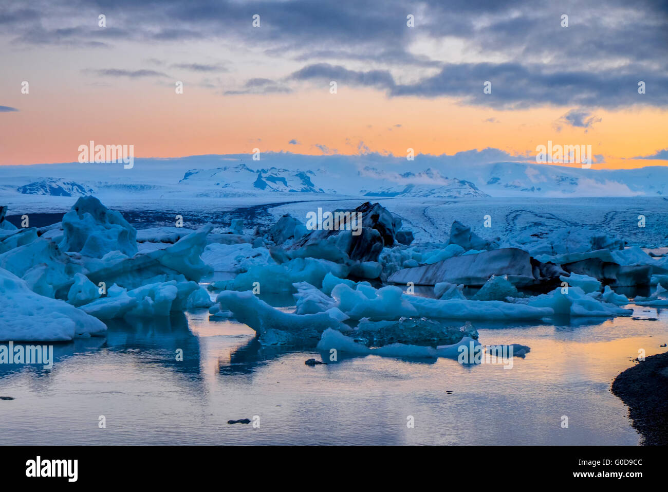 The Jokulsarlon glacier lagoon in Iceland at midni Stock Photo