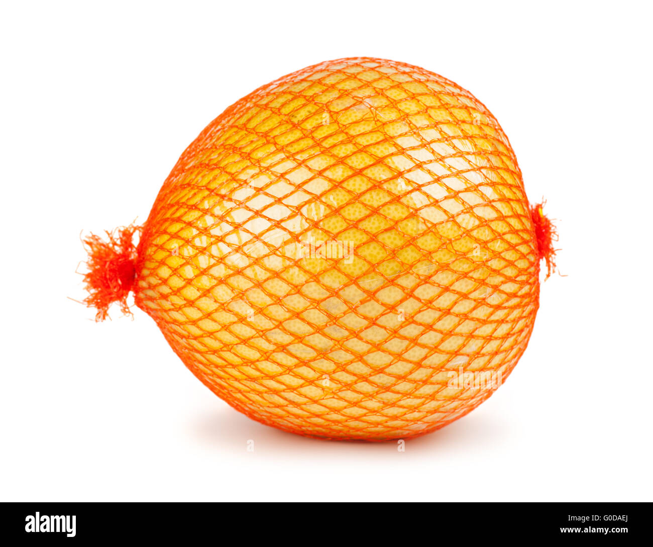 Single pomelo fruit wrapped in plastic reticle Stock Photo Alamy