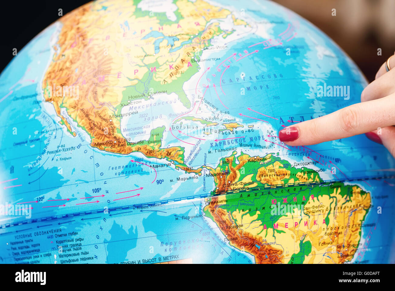 Girl pointing finger to Islands Stock Photo