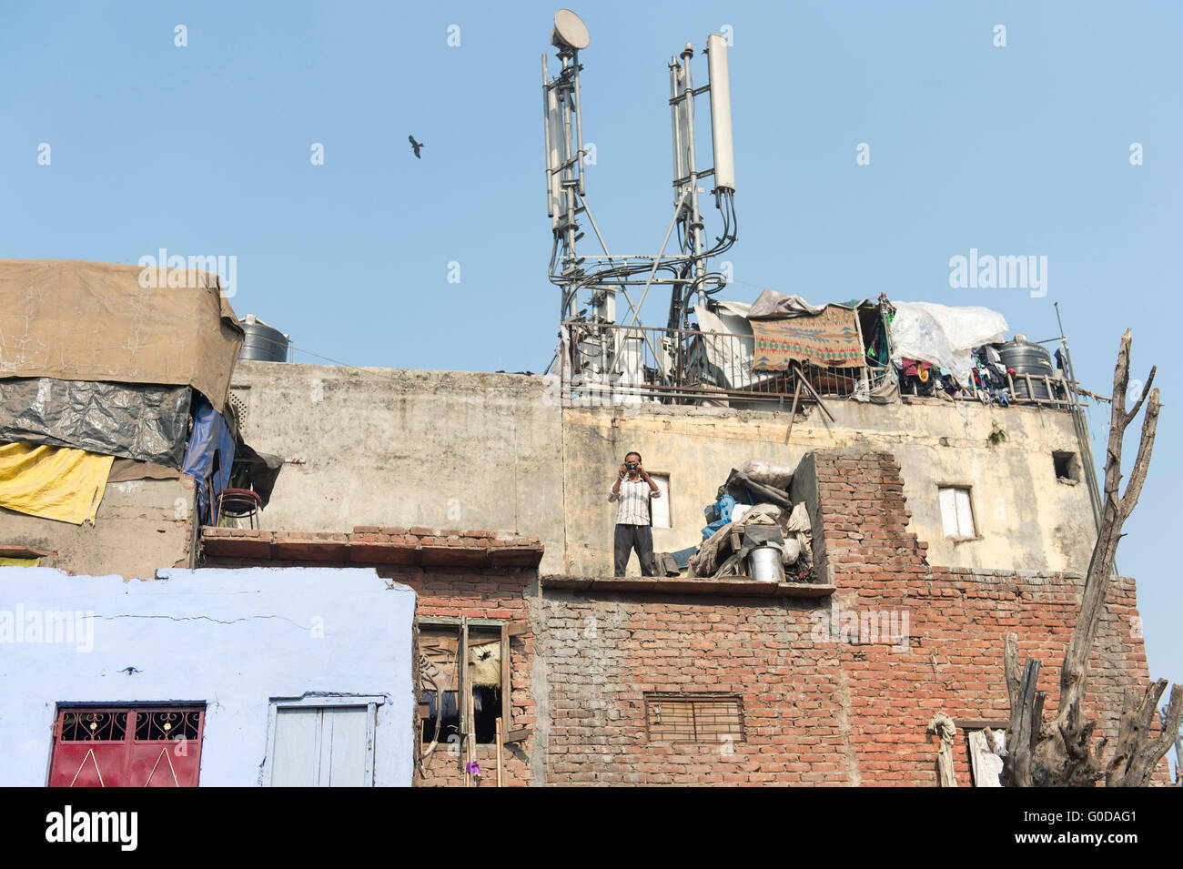 Daily life in the street of Old Delhi in India. The community of Indian people stay and doing Stock Photo