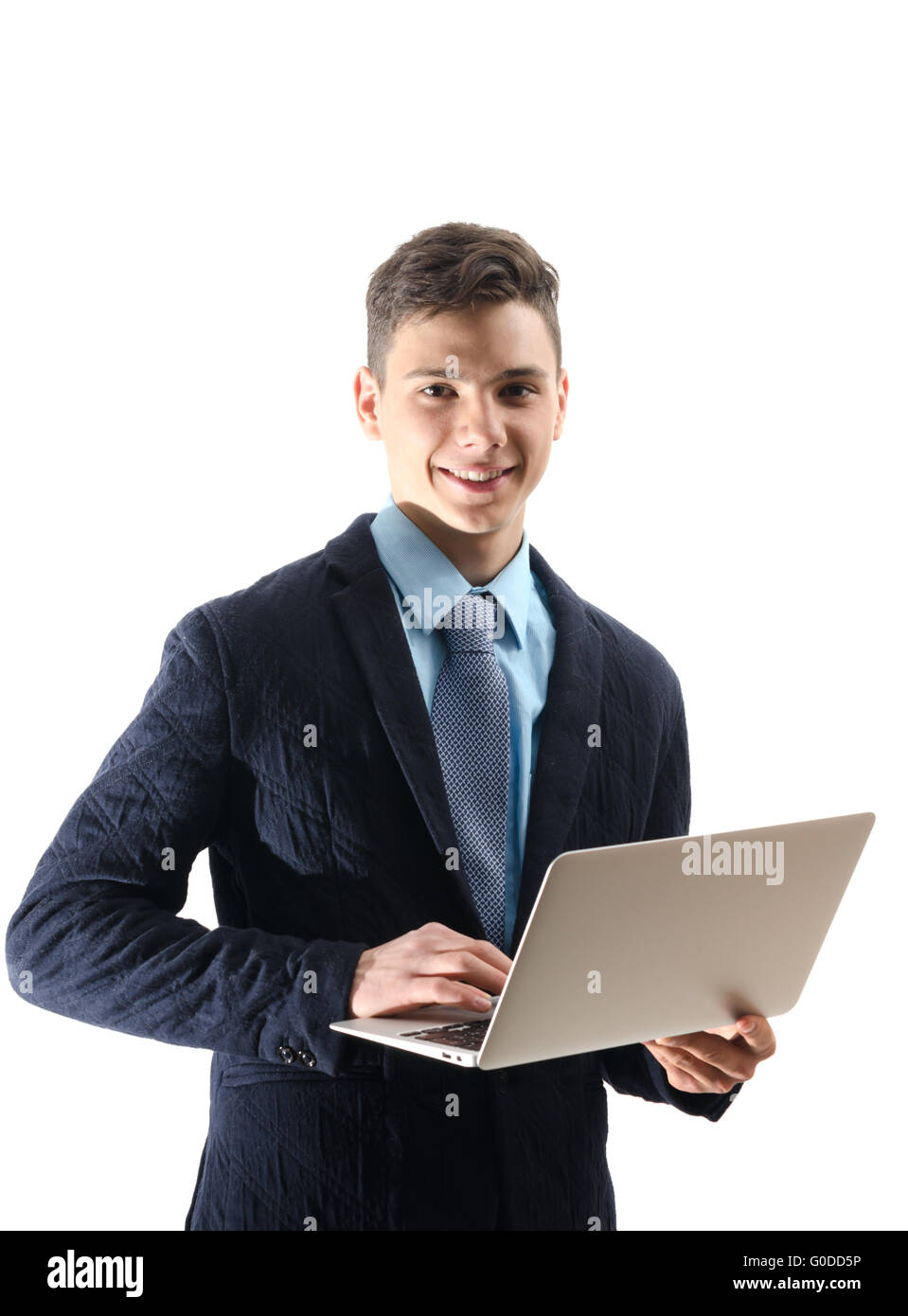 Happy teenager at college work on laptop isolated on white Stock Photo