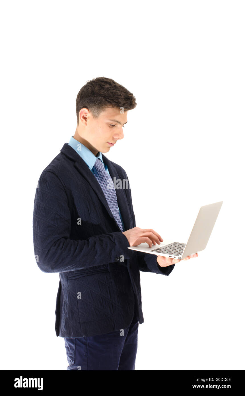 Teenager stundent concentrated working at laptop isolated on white background Stock Photo
