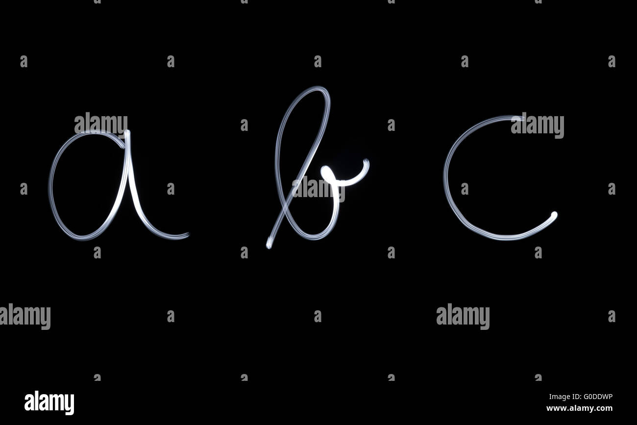 Flourescent letters 'abc' in white neon color Stock Photo - Alamy