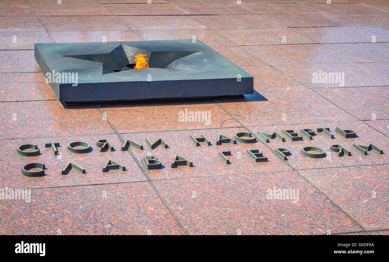 Moscow, Russia - April 10,  2015: Eternal Flame and Tomb Of The Unknown Soldier. The translation is 'Stood to death. Glory to th Stock Photo