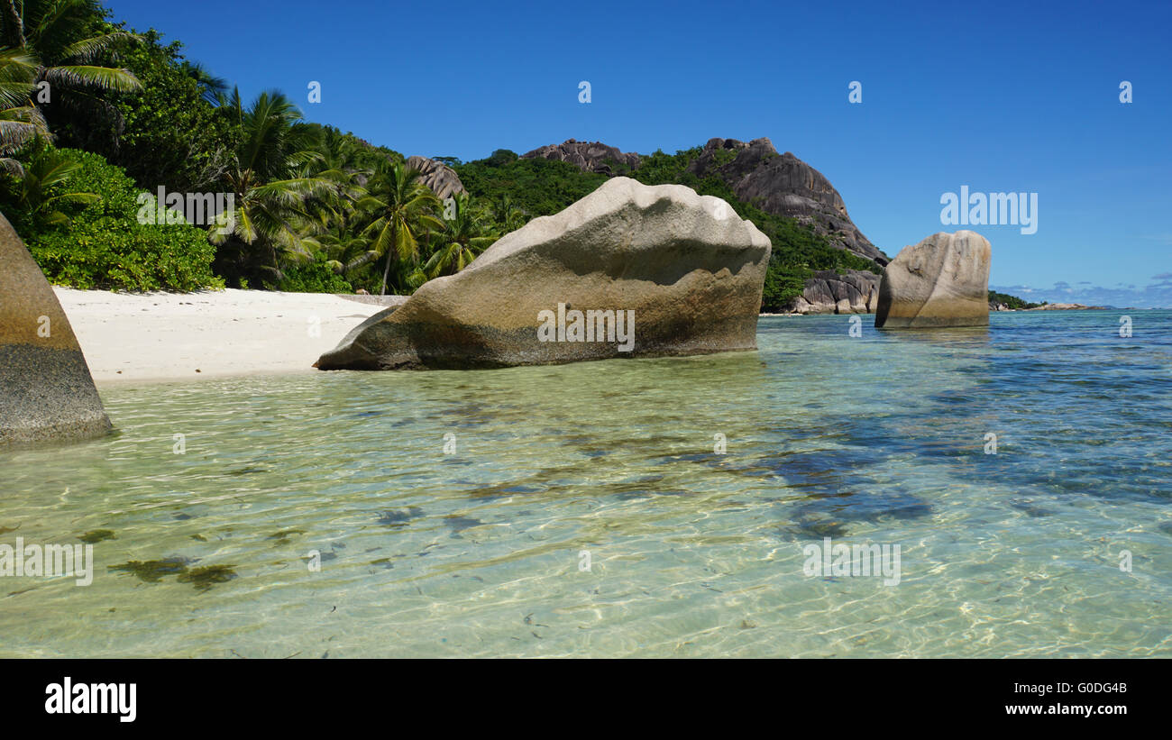 bizarre granite rocks on tropical beach on la digu Stock Photo