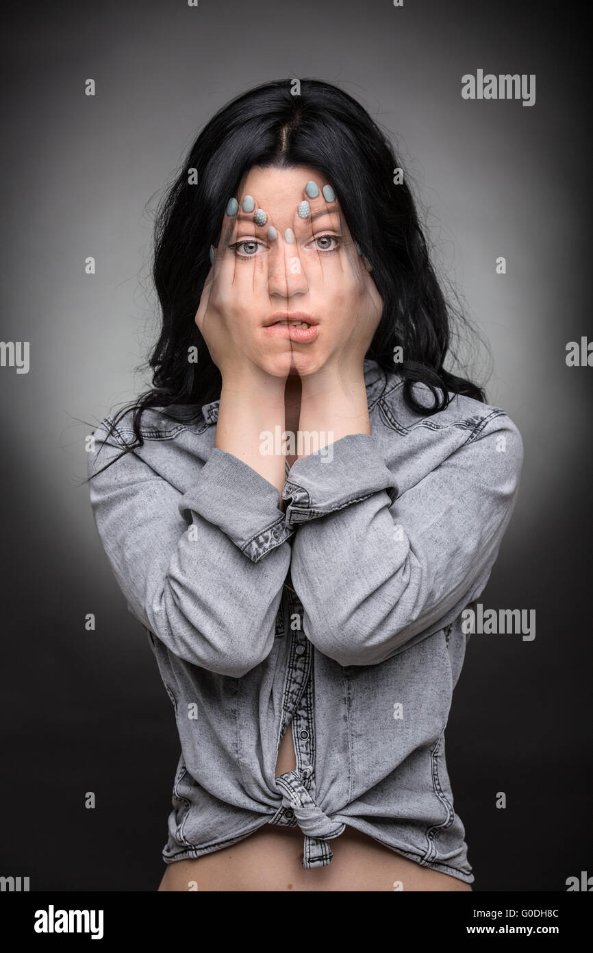 Multi exposure portrait of emotional brunette. Stock Photo