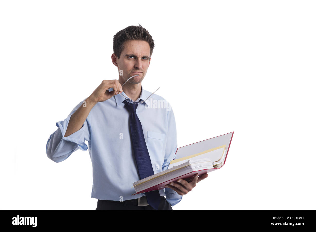 Man Hand File Folder Pensive businessman with file folders in hand Stock Photo - Alamy