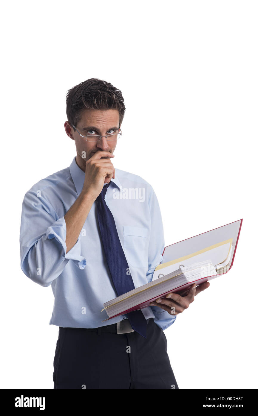 Pensive businessman with file folders in hand Stock Photo