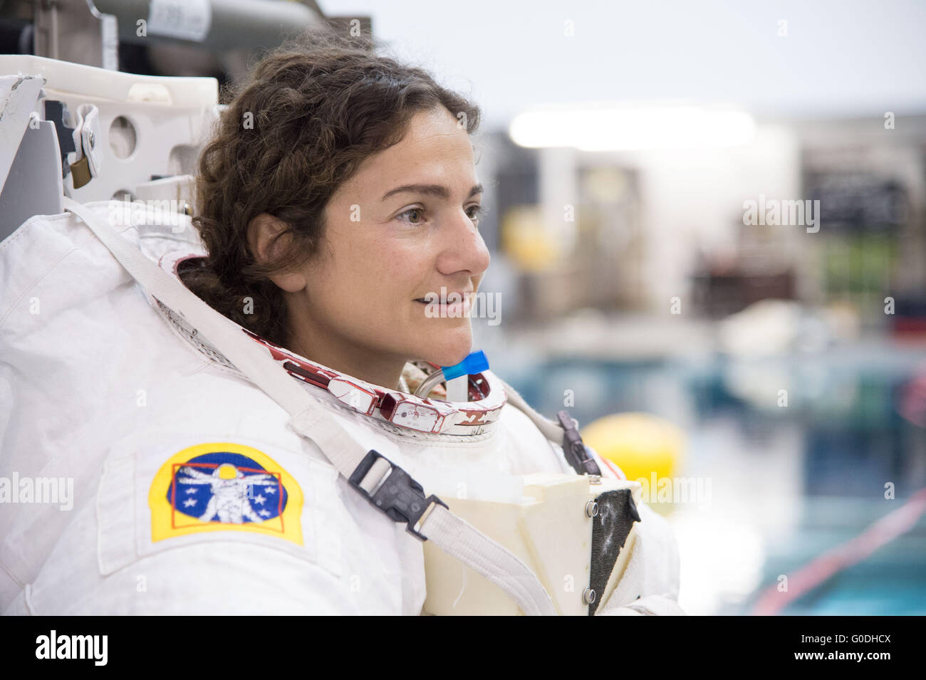 NASA astronaut Jessica Meir in her Extravehicular Mobility Unit space suit during ISS EVA training at the Neutral Buoyancy Laboratory Johnson Space Center October 27, 2014 in Houston, Texas. Stock Photo