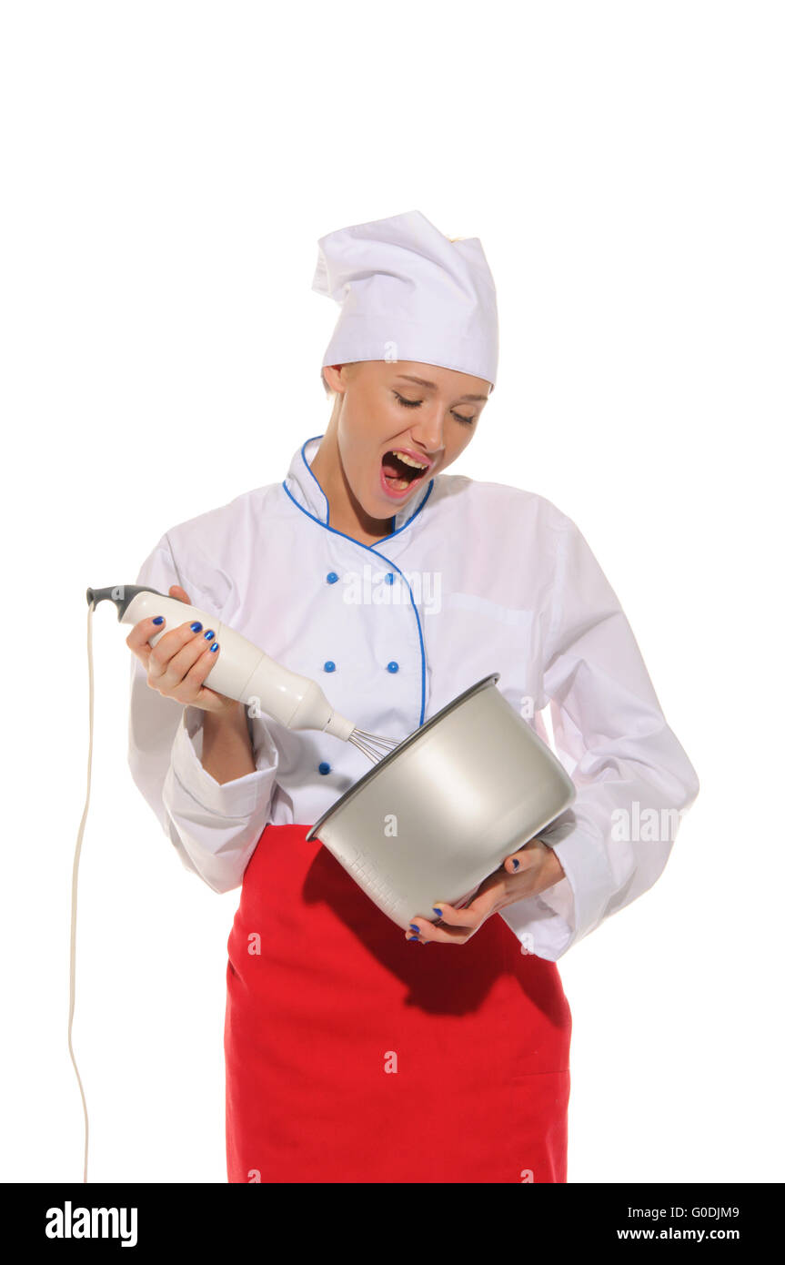 Dissatisfied woman chef with blender and pot Stock Photo - Alamy